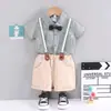 Roupa de Verão para Meninos Conjunto de Manga Curta Nova Chegada Moda de Verão Bonito Celebridade Cyber Punk Rua Frita Shorts com Alça Estampada com Laço conjunto