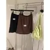 Saia Reta Casual Slimming Versátil com Renda Floral Suave Estilo Coreano Chá Verde Limão Outono 2026 para Mulheres
