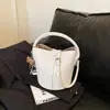 Bolsos populares para mujer de este año 2026 primavera-verano nuevo estilo bolso cruzado simple, bolso de cubo de mano elegante y casual