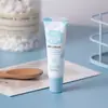 Crema para ojos de leche LAIKOU transfronteriza 15g hidratante humectante piel de ojos fabricantes en stock mayoreo crema para ojos FDA