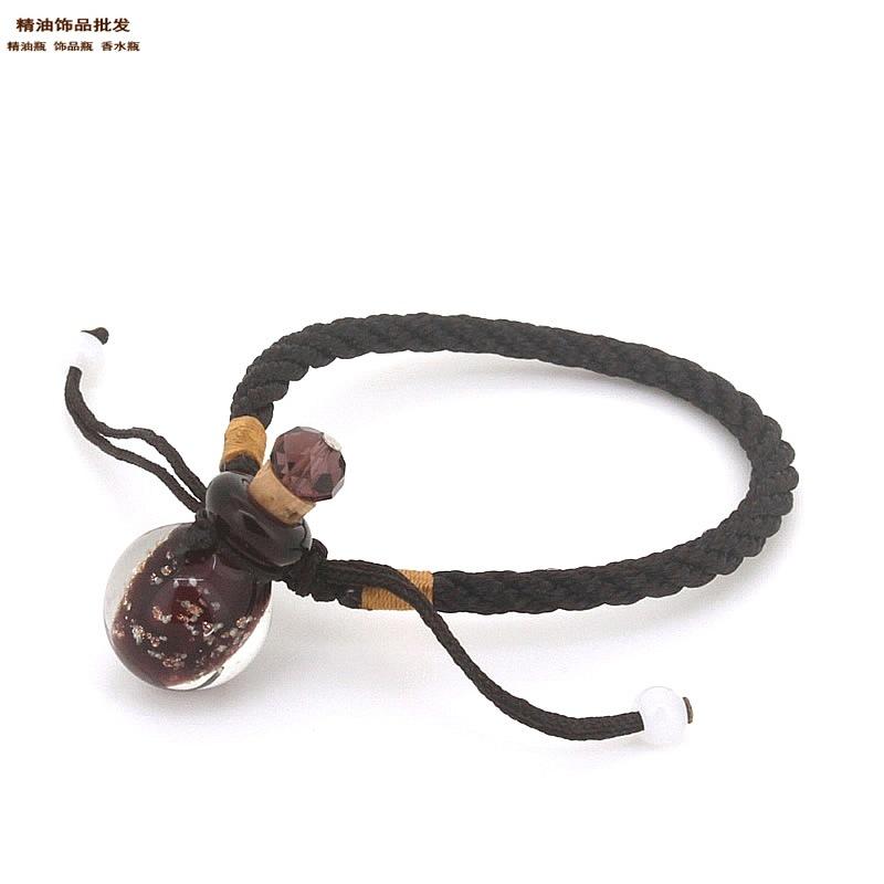 中国精油饰品网紫色球形金沙瓶网络绳手链1.jpg