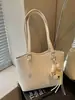 Elegante y estiloso bolso nuevo para mujer, tote de gran capacidad, versión coreana 2026, patrón tejido, bolso de hombro casual, moderno