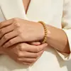 Moda INS europea y americana simple y moderna joyería de mano, pulsera de cuentas de acero inoxidable de lujo ligero, chapado en oro de 18 quilates, 6 mm