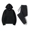 Comercio exterior otoño e invierno sudadera con cremallera + pantalones de chándal conjunto deportivo de 2 piezas, conjunto de sudadera con capucha de color liso para parejas