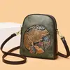 Bolso de hombro retro de estilo chino de moda para mujer, bolso de moda para madre de mediana edad con múltiples compartimentos, gran capacidad, bolso bandolera en relieve, moderno