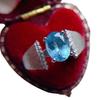 Anillo de topacio azul natural con incrustaciones de plata 925, joyería de tesoro de color directo de fábrica, cepillado tridimensional de 6 x 8 mm