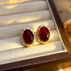 Pendientes vintage antiguos medios de alta fijación ovalados con textura ojo de tigre marcados Diseño nicho Lujo ligero Pendientes de alta gama