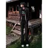 Pantalones de Hombre Lisos de Caída Suave Estilo High Street Otoño 2026, Estilo Hong Kong Moderno Versátil Adelgazantes y Alargadores de Piernas Ligeramente Acampanados