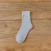 Calcetines de rizo engrosados calcetines de otoño e invierno para hombres y mujeres gruesos cálidos calcetines para el hogar color liso simples calcetines Joker al por mayor