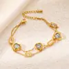 Pulsera de Acero Titanio Dorado Incrustada con Turquesa Pulsera Mariposa Cubana de Acero Inoxidable Joyería de Moda Simple Europea y Americana Venta al por Mayor