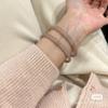 Pulsera Jingle de Un Paso Tira Delgada Accesorios de Ropa China Prohibida Pulsera de Chica Hermosa Tono de Sacudida Pulsera de Venta Caliente Moda para Mujer