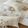 Conjunto de cama de quatro peças em estilo francês, sutilmente luxuoso, bordado, para outono/inverno, 50 fios, fio duplo, 100% algodão, tecido escovado, com estética relaxada e casual.