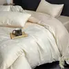 Conjunto de cama luxuoso e de alta qualidade para outono/inverno, espesso, 100% algodão, quatro peças, incluindo um lençol de algodão puro, uma fronha de colcha jacquard e uma colcha quente