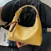 Bolso de hombro minimalista de alta costura transfronterizo 2026 nuevo y moderno tipo bolsa de albóndigas para mujer, elegante bolso de hombro, bolso cruzado casual