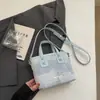 Bolso de Mano Pequeño de Moda Tendencia para Mujer 2026 Nuevo Estilo Versátil Bolso de Hombro Cruzado Casual para el Trabajo Bolso Tote Tipo Cubo