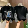 Camiseta de manga larga para niño 2026 nueva ropa de otoño para niños, camiseta básica de algodón puro de imitación de dos piezas para niño, top para niños mayores