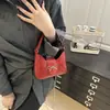 Bolso Pequeño Texturizado 2026 Nuevo Modelo Transfronterizo Bolso Cruzado Versátil para Mujer Bolso tipo Baguette de Un Solo Hombro para Debajo del Brazo Nicho Francés
