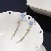 Pendientes de Borla con Mariposa de Cristal para Mujer, Pendientes Elegantes Super Hada para Mujer, Nuevos Pendientes de Botón de Diseño de Nicho de Lujo Ligero 2025