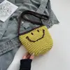 2025 Estilo Japonés Nuevo Bolso de Cubo Tejido con Cara Sonriente Kawaii Cara Sonriente Bolso Pequeño Bolso Tejido de Verano Bolso de Playa de Vacaciones