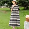 Elegante y moderno vestido de noche de algodón y seda de verano nuevo para madres de mediana edad y mayores, elegante vestido casual holgado para el hogar para mujer