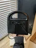 Bolsa de mão feminina minimalista estilo ins coreano 2026 nova bolsa de ombro versátil para o dia a dia com design de laço doce