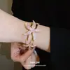 Pulsera Metálica Esmaltada de Estrella de Mar Europea y Americana Transfronteriza Abrible Pulsera Retro Moda con Temperamento Lujo Ligero Sensación de Alta Gama Joyería de Mano para Mujer