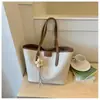 Bolsa de Palha Tecida Retrô Feminina 2026 Nova Tendência Fashionável Bolsa de Ombro Único Grande Capacidade Textura Simples Bolsa para o Dia a Dia