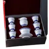 Jingdezhen Color Bajo Esmalte Pintado a Mano Azul y Blanco Exquisito Tazón con Tapa Kung Fu Juego de Té Auténtico Porcelana Blanca Alta Alta Temperatura Juego de Té Caja de Regalo