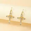 Pendientes de aro con cruz de diamantes de alto sentido de la moda europea y americana para mujer, personalidad, diseño creativo, pendientes huecos, joyería para la oreja, venta al por mayor