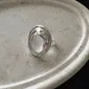 Nuevo producto de estilo europeo y americano de lujo ligero personalizado, anillo abierto de moda con forma de huevo translúcido para mujer, diseño versátil de gota de agua curvada