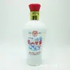 Botella de vino blanco botella de vidrio blanco leche 500ml fabricantes de botellas de vidrio Yuncheng hacen un kilo de botella de vino blanco flor horneada botella de vino vacía