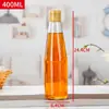 Garrafa de vidro de óleo de gergelim com tampa meia jin por jin frasco de perfume à prova de vazamento rosca comercial cônica selada garrafa vazia de óleo de gergelim