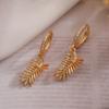Aogu Xiaozhong - Pendientes colgantes con plumas de circón chapadas en oro auténtico y cobre para mujer, estilo retro, combinables, nuevos