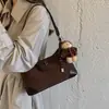 Bolso de hombro de moda estilo vintage, bolso de axila para mujer, bolso cruzado simple versátil nuevo de gamuza