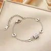 Pulsera de Acero de Titanio Brillante Dorada de Cintura Pequeña para Mujer, Simple y que No se Desvanece, Joyería de Mano de Moda Popular, Joyería de Nicho de Estilo Genial