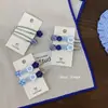 Pinza de flequillo azul estilo coreano con botón, pinzas BB estilo ins, diseño retro de nicho, pinza de pico de pato versátil, accesorio para el cabello