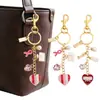 Pentagrama en forma de corazón con goteo de aceite de aleación para labio, lápiz labial, gafas de sol, colgante para bolso de hombro, llavero, decoración de bolso, accesorio