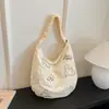 Bolsa de nicho coreana para mujer 2026 nuevo modelo bolsa de mano de gran capacidad bolsa de hombro de felpa bolsa cruzada para el trabajo transfronteriza