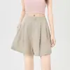 Tiro Real Traje de Lino Tencel Shorts para Mujer Verano Estilo Delgado 2026 Nuevo Cintura Alta Línea A Pierna Ancha Capris de Botón de Flor