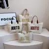 Comércio Exterior Atacado 2026 Nova Bolsa de Palha Moda Feminina Grande Capacidade Ombro Único Elegante Carta Transversal Bolsa Tote