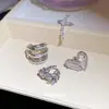 Clip para Oreja~Corazón de Zirconia Pendientes Elegantes Exquisitos Modelo Nuevo 2026 Clip para Hélice de Oreja Sin Perforar Accesorios para Oreja de Lujo Ligero Gama Alta