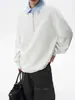 Sudadera con capucha de dos piezas falsa de diseño vanguardista con bloques de color y solapas para hombre, otoño e invierno, camisa polo de manga larga con medio cierre de cremallera de empalme americano, moderna