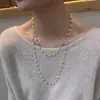 Nuevo collar de perlas artificiales de doble capa, cadena para la clavícula de moda exquisita transfronteriza, cadena de suéter de lujo ligero estilo francés