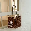 Bolso tote de lino de alta gama de nicho con lunares, nuevo modelo 2026, versátil para ir al trabajo, bolso de hombro y axila de gran capacidad