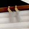 Pendientes de Borla Plegados en Forma de C Aguja de Plata Retro Francés Elegantes de Nicho Versátiles Pendientes de Lujo Accesible Pendientes de Gama Alta para Mujeres