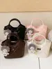 Bolso Pequeño Retro de Nuevo Estilo de Alta Gama Transfronterizo 2026 para Mujer, Bolso Cruzado Versátil para Hombro, Bolso Cubo de Moda