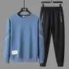 Traje deportivo casual para hombre de primavera y otoño Chaqueta Pantalones Sudadera de cuello redondo Pantalones de manga larga Conjunto de traje deportivo