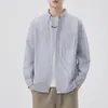 Camisa de manga larga 2026 moda primavera y otoño camisa de rayas para hombre chaqueta casual holgada versátil top chaqueta