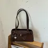 Bolsa de Ombro Único para Motocicleta Moda Feminina 2026 Nova Bolsa de Mão para o Dia a Dia Pequena Versátil para Sair para o Trabalho Bolsa Baguete