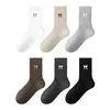 Calcetines de algodón puro para mujer para primavera y otoño, calcetines de media pantorrilla sin costuras, estilo universitario, calcetines bordados con lazo, calcetines grises apilados estilo coreano